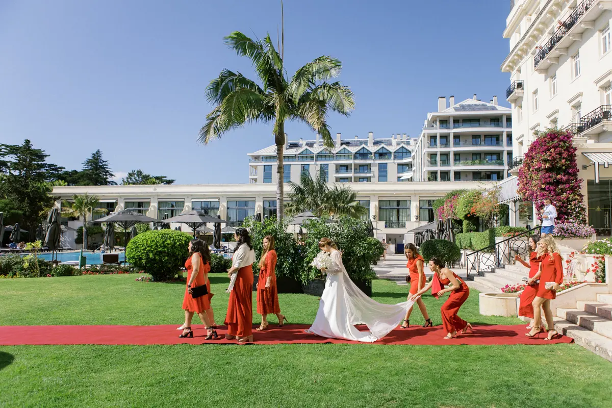 Bride and maids of honor at the garden of Palacio Estoril Hotel
