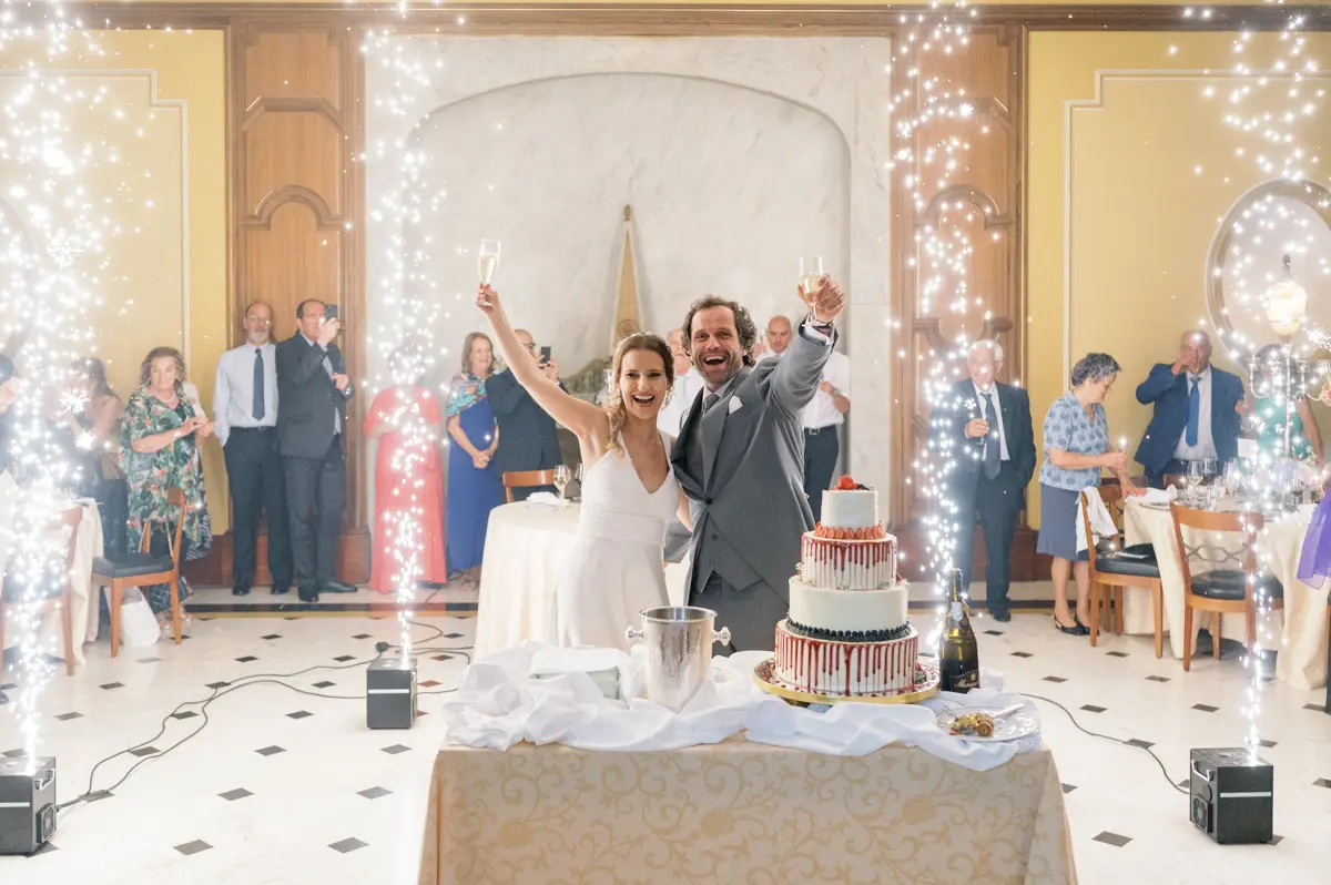 Couple celebrating on their wedding day at Palácio Estoril Hotel a luxury Wedding Venue in Estoril, Lisbon, Portugal