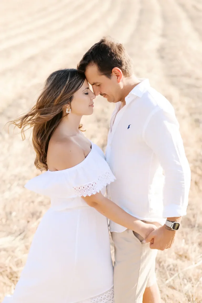 Stunning sunset light on a freshly harvested wheat field during pre-wedding in Portugal.